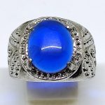 Cincin Royal Blue King Sapphire, Batu King Sapphire oval cabochon, Cincin pria batu biru royal, Cincin akik King Sapphire, Cincin kantoran King Sapphire, Cincin batu permata pria, Perhiasan pria batu biru, Desain cincin King Sapphire, Cincin mewah pria, Batu King Sapphire asli, Perawatan cincin King Sapphire, Cincin elegan pria, Cincin batu akik eksklusif, Cincin formal pria, Cincin biru royal fashion,